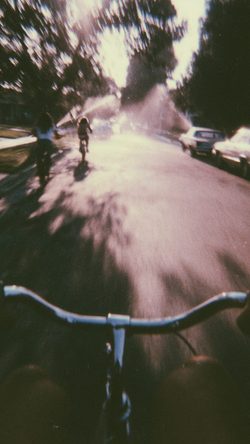 Blur Home Video Style First Person Bicycle Ride Motion Vintage Street Sunlight